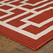 7' X 10' Red And Ivory Geometric Stain Resistant Outdoor Area Rug - Home Decor & Things Are Us